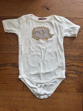 Milkbarn White Baby One-Piece with Hedgehog Applique in Gray and Mustard